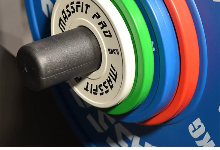 举重杠铃片是什么材料做的